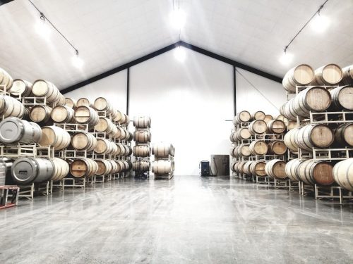 Wine is aged and stored in a carefully climate-controlled barrel storage room.