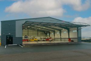 Exterior Photo of an Airplane and Vehicle Hangar