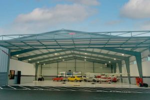 Exterior Photo of an Airplane and Vehicle Hangar
